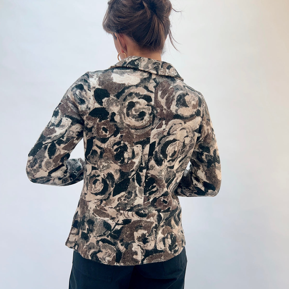 Habitat Aspen Peplum Jacket in Black, back view showing the peplum hem silhouette and abstract floral print in black, taupe, and cream