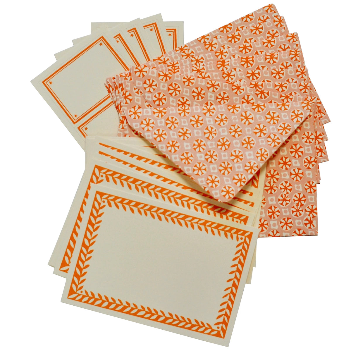 Set of patterned paper sheets with orange designs on a white background