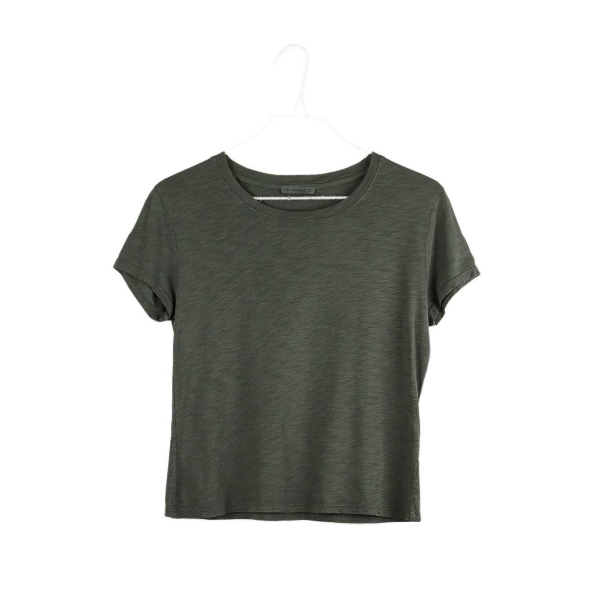 It Is Well Cropped Tee in Olive, flat hanger shot on white background showing solid olive army green lightweight slub jersey, clean crew neck, short fitted sleeves with slight cuff, and slightly cropped length in a slim petite fit