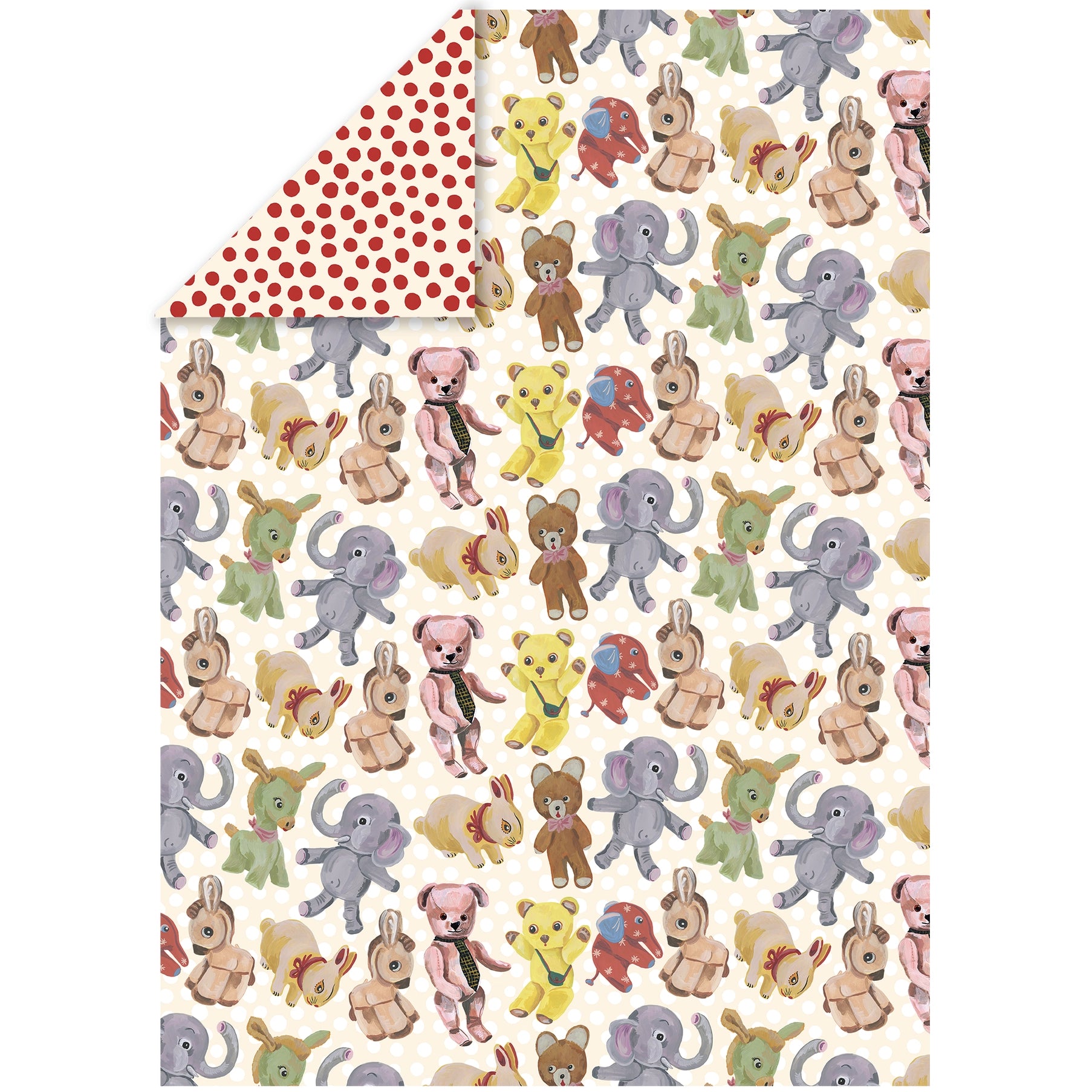 Plushies wrapping paper by Nathalie Lété laid flat showing the front side with an all-over pattern of vintage plush animals including bears, elephants, rabbits, and donkeys on a cream background, with a corner folded back to reveal the red polka dot reverse