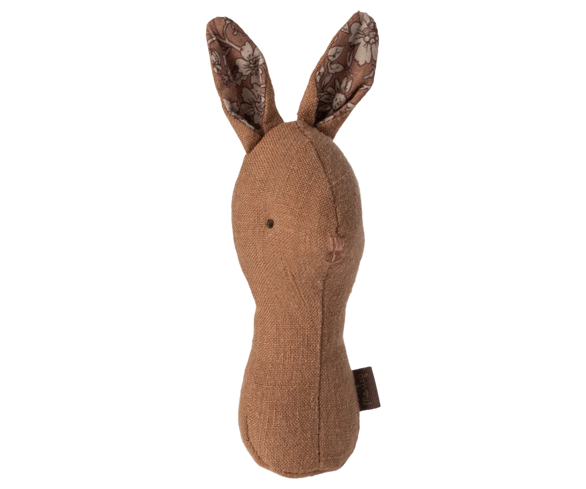 Maileg Lullaby Friends Bunny Rattle in Chocolate on a white background — a soft warm brown linen bunny rattle with upright floral-lined ears and an ergonomic handle shape
