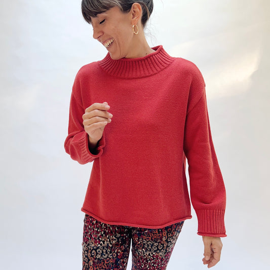 Habitat Fireside Cabin Sweater in Sienna, front view showing the wide ribbed mock neck and deep ribbed cuffs in sienna red
