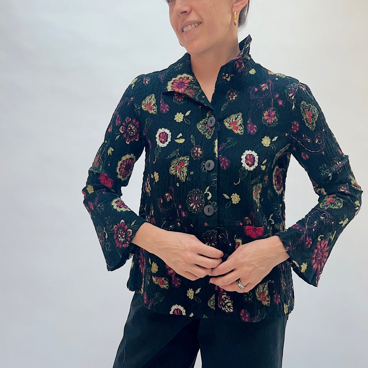 Habitat Floral Crinkle Cotton Flounce Shirt in Black, front view showing the button-front closure, point collar, and vibrant floral print on crinkle cotton
