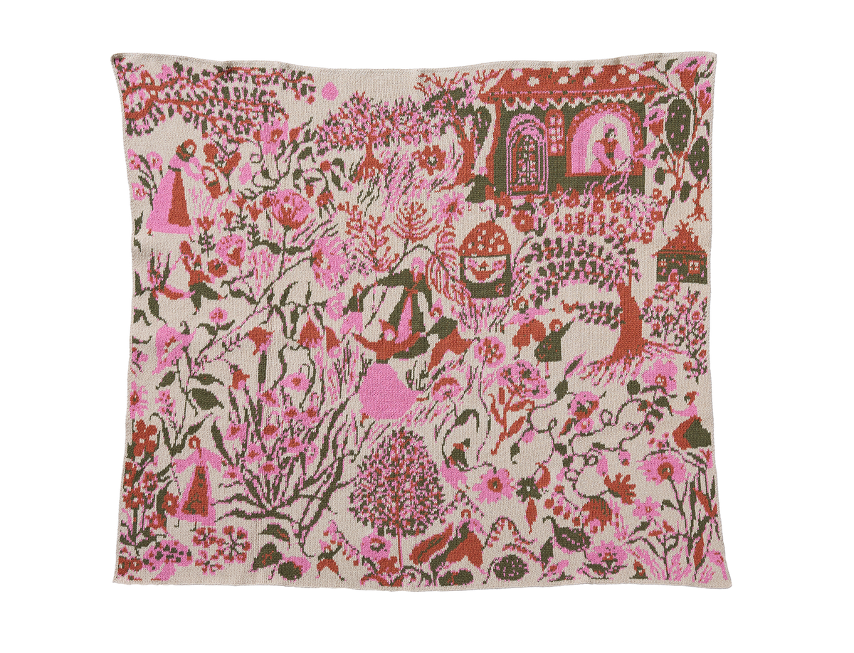 Spring Meadow Carnation child blanket laid flat, with pink flowers, green stems, and rust-colored figures on cream.
