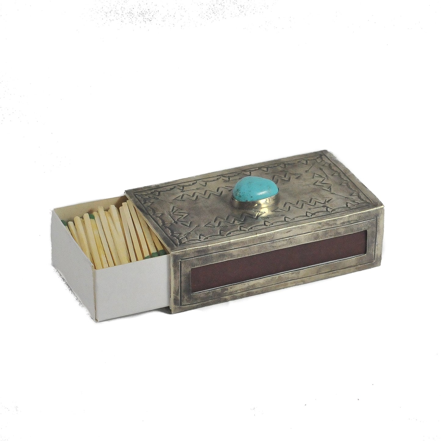 Alexander Rustic Silver Large Stamped Matchbox with Turquoise, shown open and filled with matches, displaying the hand-stamped Southwestern geometric pattern on the silver lid and a turquoise stone cabochon at center, with a brown striker strip on the side