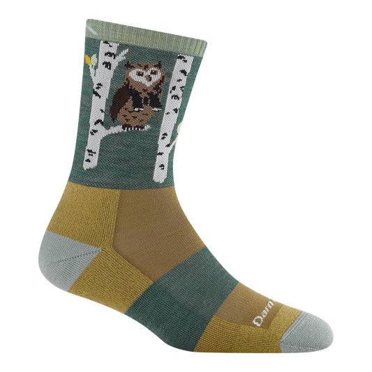 A single crew sock with a woodland owl design on a white birch tree, featuring a color-blocked pattern in sage green, mustard yellow, brown, and light gray on a white background.