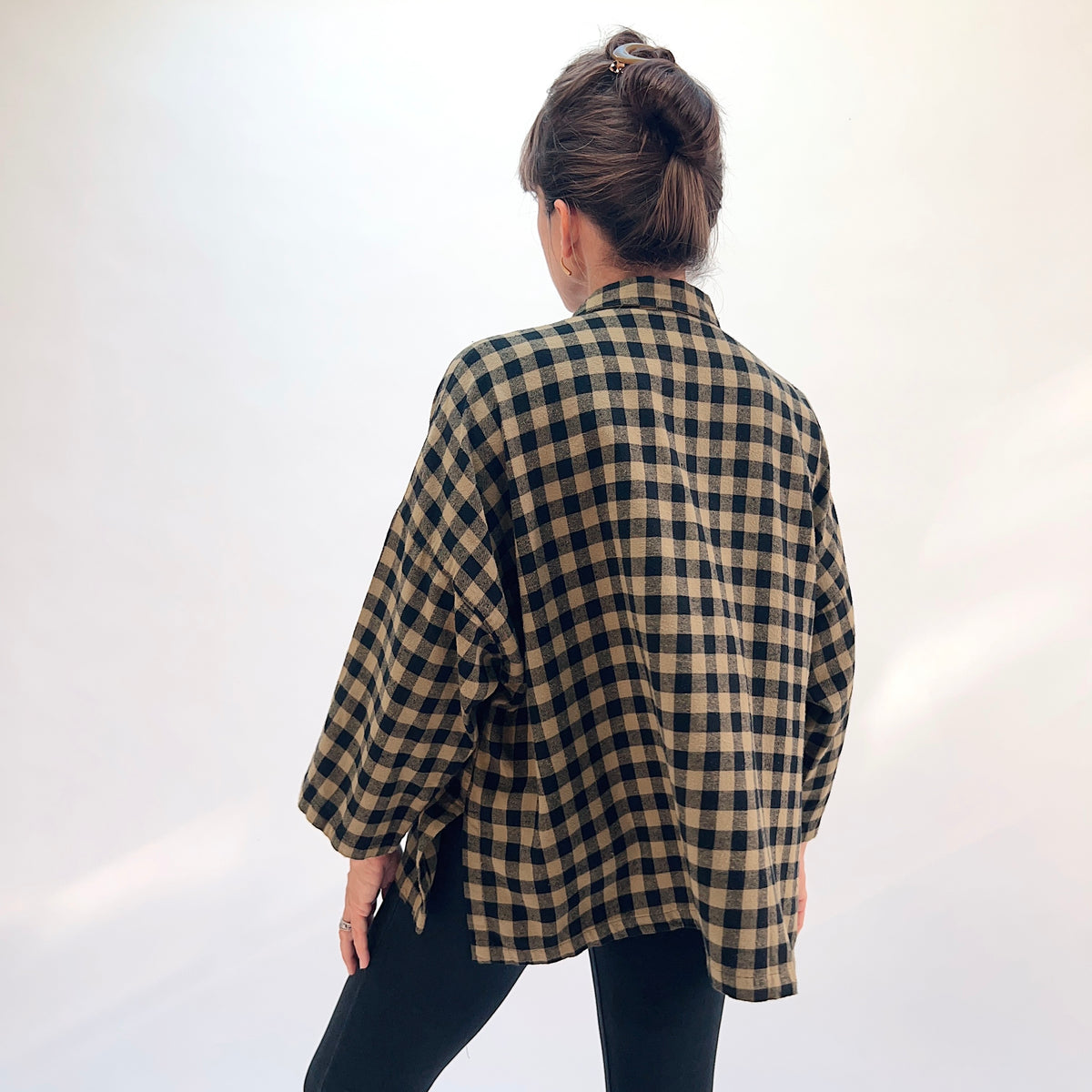 Eleven Stitch Big Check Big Shirt in Olive, back view showing the relaxed boxy silhouette and mustard contrast side vents in olive and black gingham check cotton flannel
