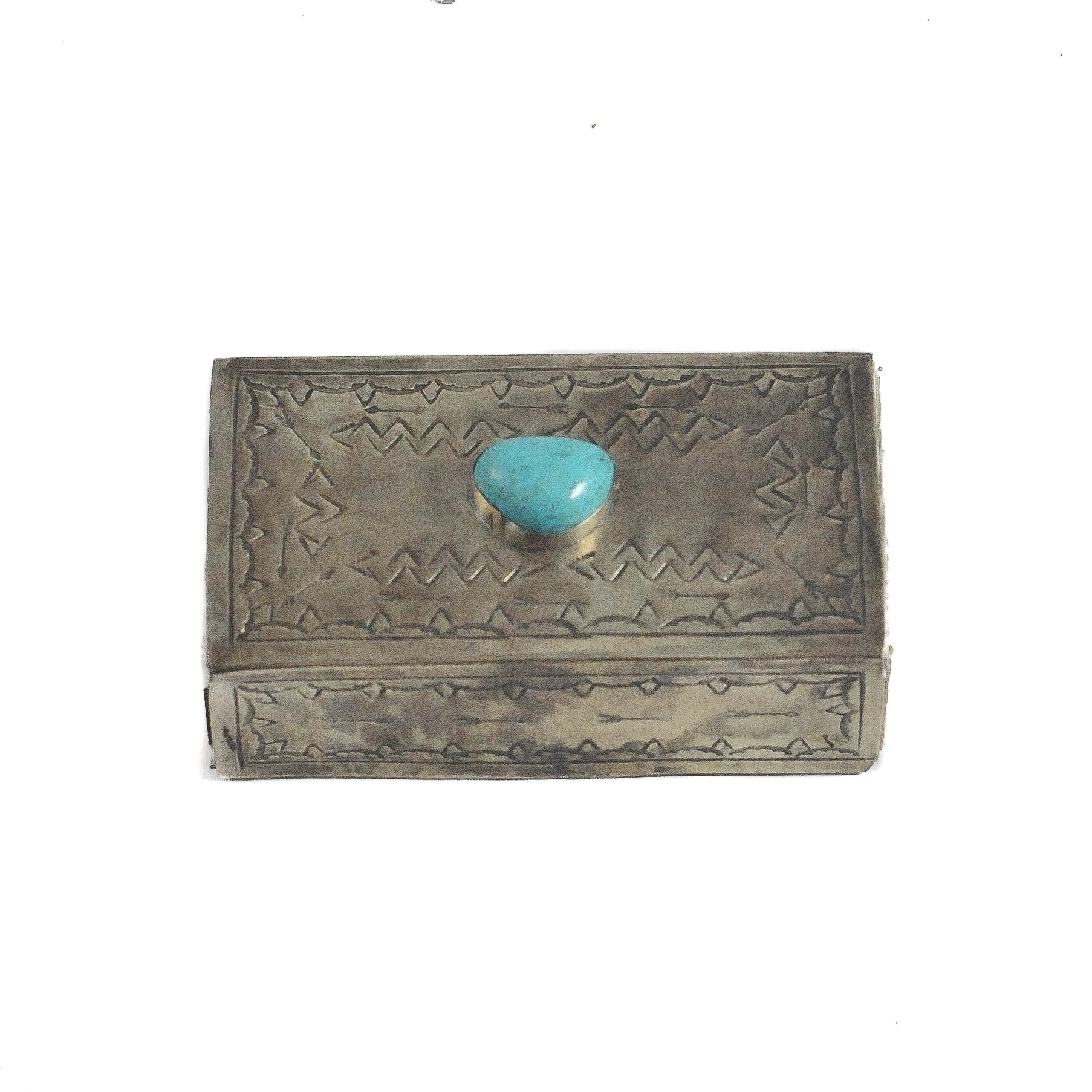 Top-down view of the J. Alexander Rustic Silver Large Stamped Matchbox with Turquoise, closed, showing the full hand-stamped geometric pattern across the silver lid and a round turquoise stone cabochon at center