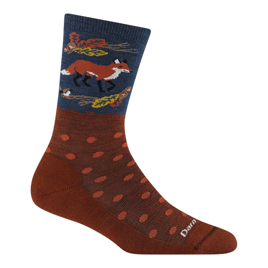 A single crew sock shown on a white background, featuring a dark navy upper section with a fox, leaves, and bird motif, and a rust brown lower section with orange polka dots.