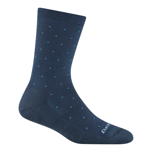 Navy sock with small white dots on a white background