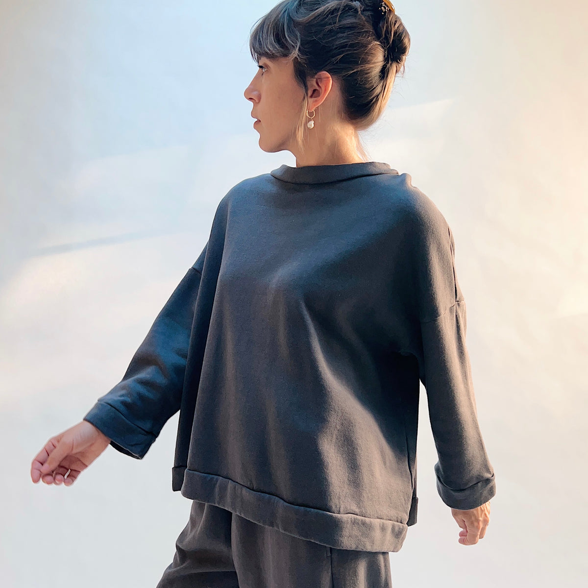 Front view of Alden Fleece Sweatshirt in Moonlight, showing the oversized shape and wide sleeves with folded cuffs.
