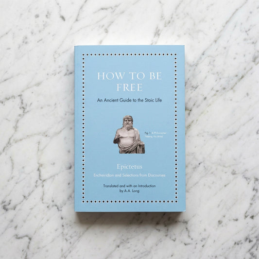 Light blue cover of How to Be Free by Epictetus, translated by A. A. Long, featuring a sculpted bust of a bearded figure.
