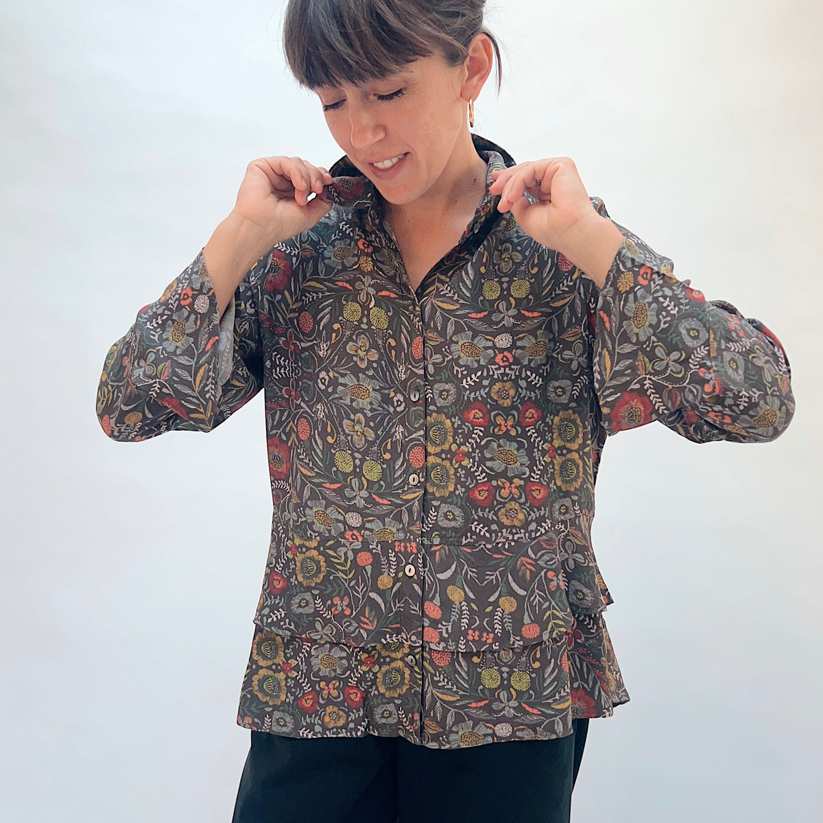 Habitat Crepe Garden Flounce Shirt in Olive, front view showing the point collar, button-front closure, and dense garden floral print

