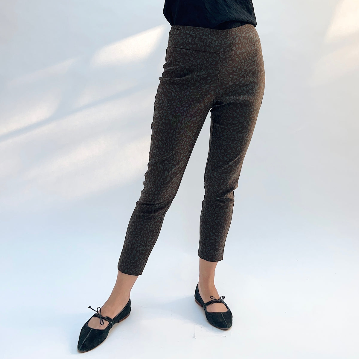 Lisette Sepia Leopard Slim Ankle Pant, front full-length view showing the pull-on waistband and slim ankle fit in sepia leopard print
