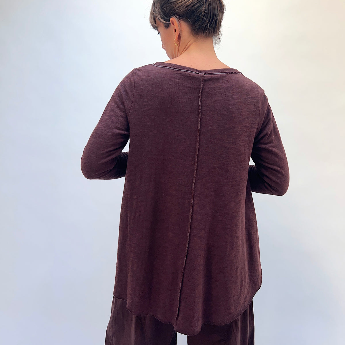 North Star Base Shorter High Low Double Cotton Tee in Chicory, back view showing the center back seam detail and high-low hem in chicory brown
