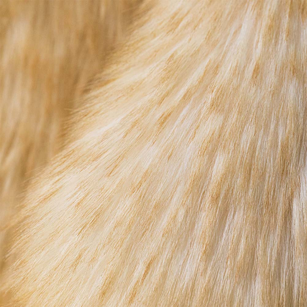 Close-up detail of the Jellycat Springlowe Luxe Bunny's ultra-soft, fluffy cream and golden-toned fur texture