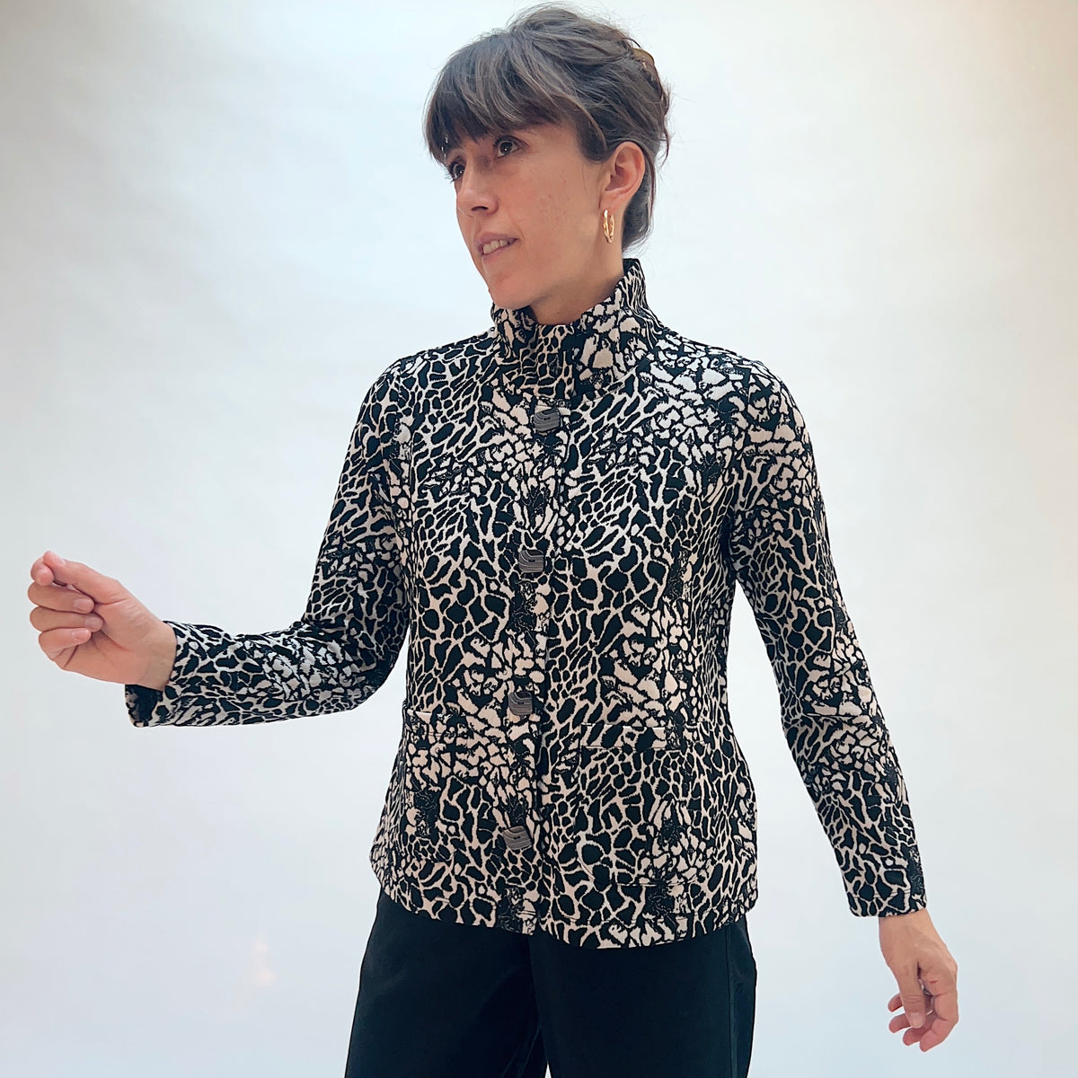 Habitat Spot on Cropped Jacket in Dove, front three-quarter view showing the funnel neckline and abstract spot jacquard print in black and taupe on dove
