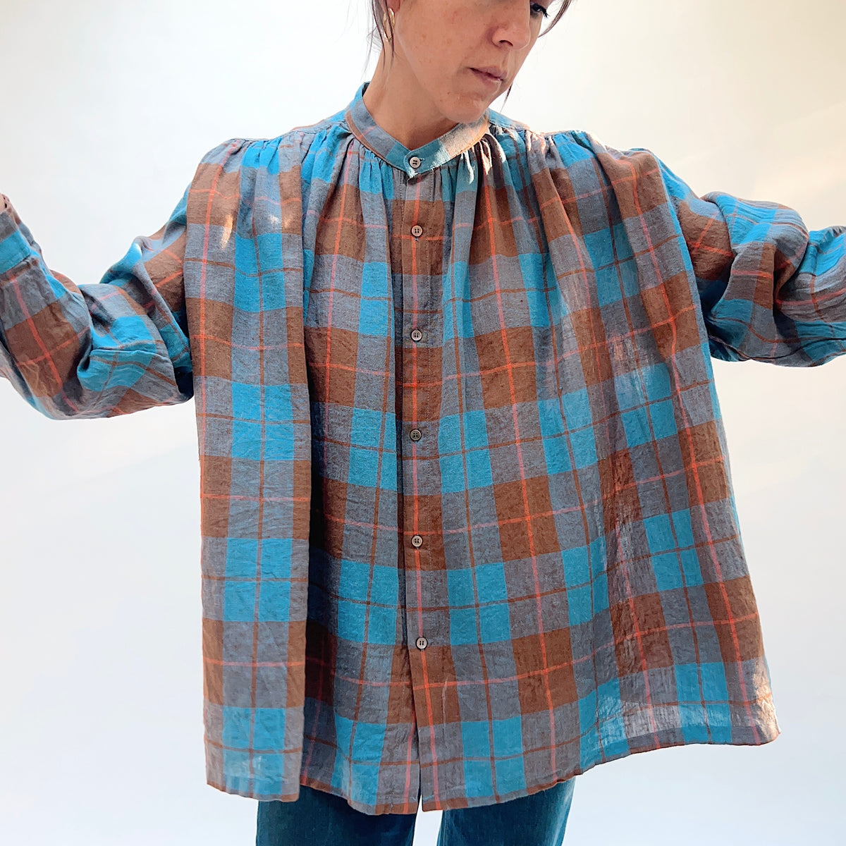 Ichi Antiquités Woven Plaid Check Shirt in Blue, close front view with arms extended showing the plaid fabric and button placket.

