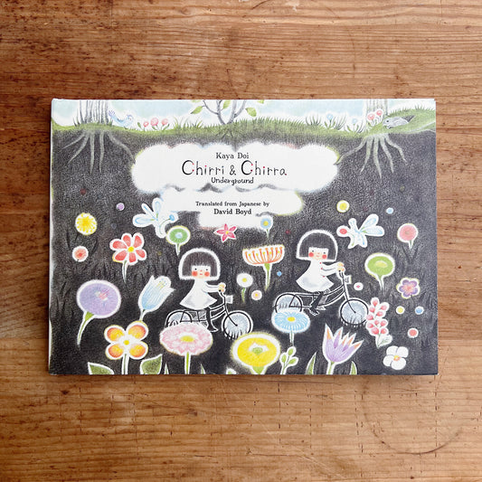 Cover of 'Chirri & Chirra: Underground' featuring illustrations of nature and magical elements such as flowers, roots, and moles.