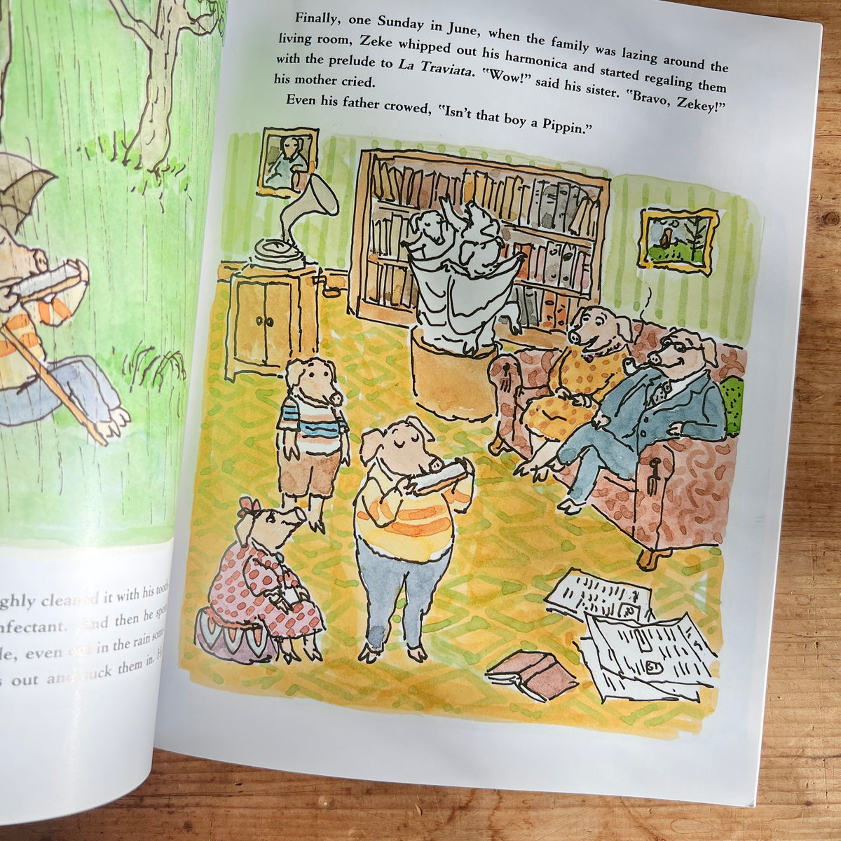 Open pages of Zeke Pippin showing Zeke playing his harmonica for his family in their living room.
