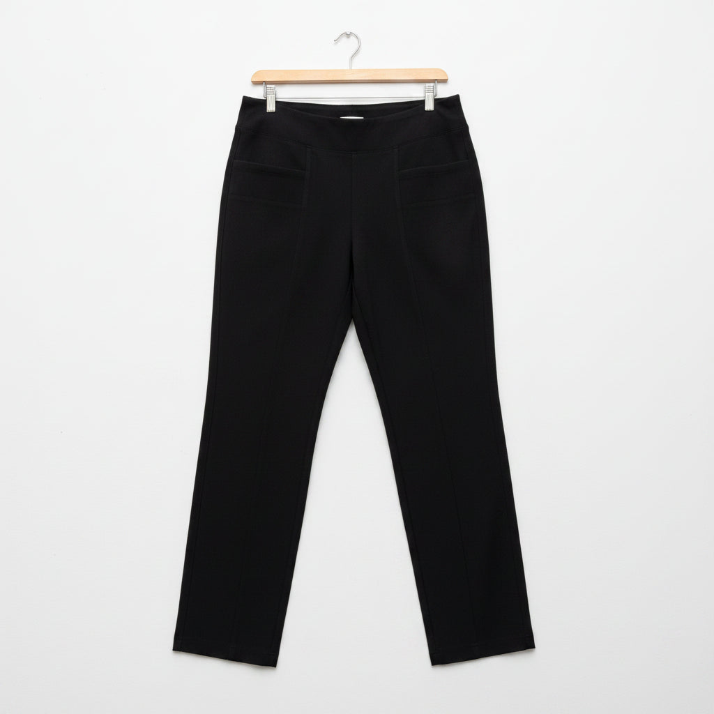 Black pants on a hanger against a white background