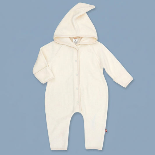 Flat lay view of Zutano's Cream Cozie Fleece Elf Suit with a pointed hood, front snap closures and long sleeves and legs.
