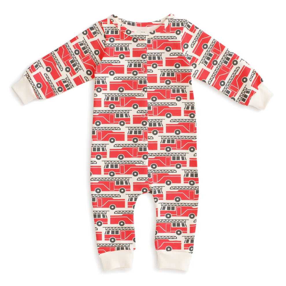 A baby long-sleeve footless french terry one-piece jumpsuit with an all-over red fire truck pattern on a white background, featuring white ribbed cuffs and ankles.