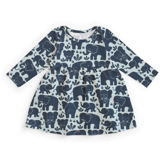 A long-sleeve baby dress with an all-over navy blue elephant pattern on a white background, laid flat against a white studio background.
