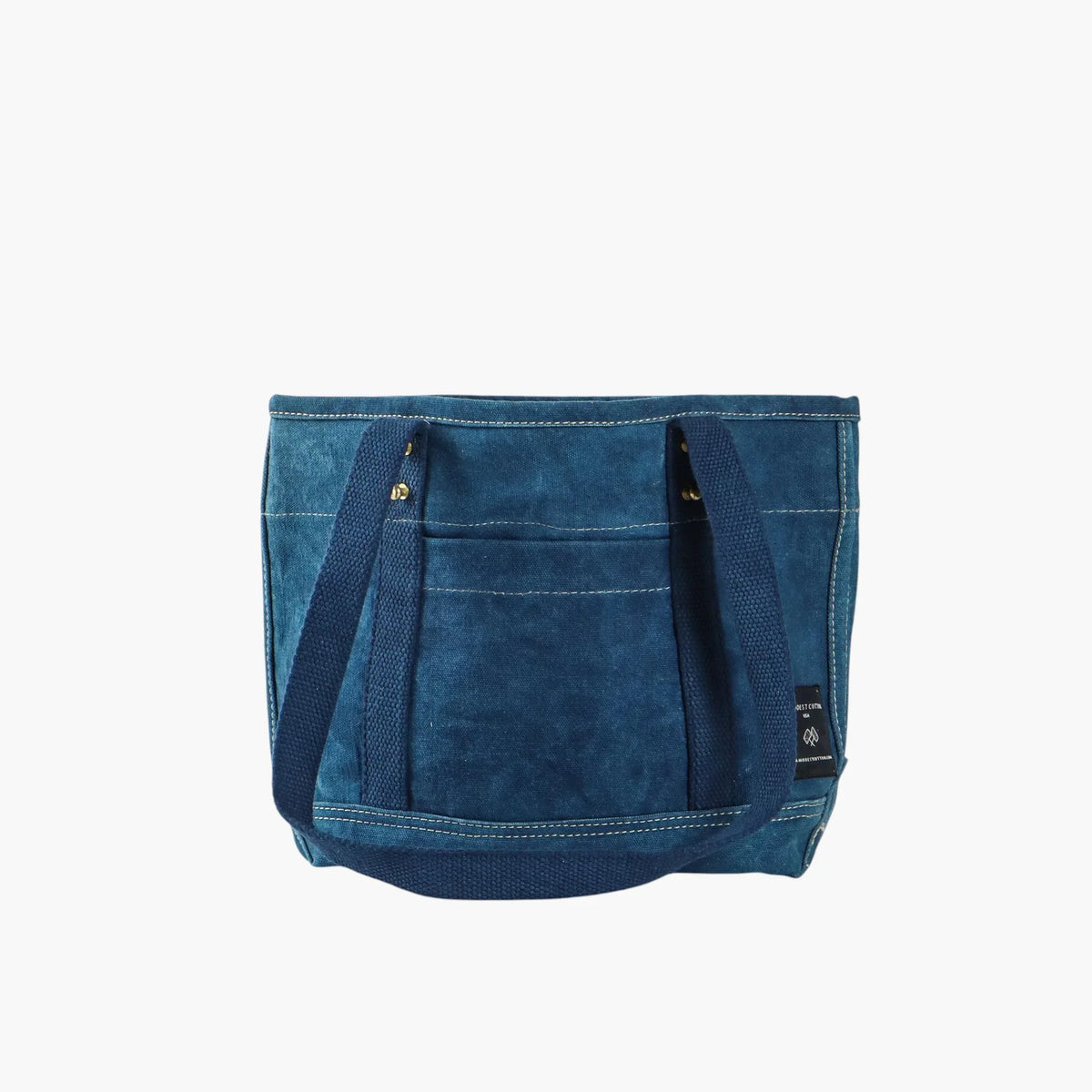 Indigo canvas Lunch Tote with long blue webbing shoulder straps and an exterior front pocket.
