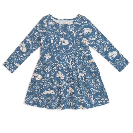 A long-sleeve blue dress with a white woodland print featuring rabbits, deer, mushrooms, and birds, shown flat against a white background.