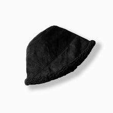 Load image into Gallery viewer, Black bucket hat on a white background

