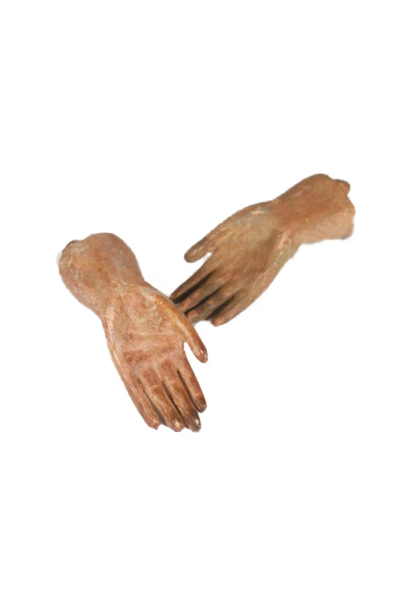 Pair of brown stone hands on a white background