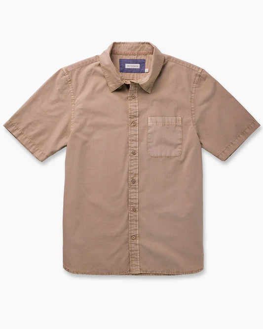 Ace Rivington Tailored Shirt in Compact Poplin Taupe Vintage flat lay, front view showing taupe vintage wash 100% cotton, spread collar, short sleeves, tonal corozo-style button placket, and single left-chest patch pocket with pen slot on white background
