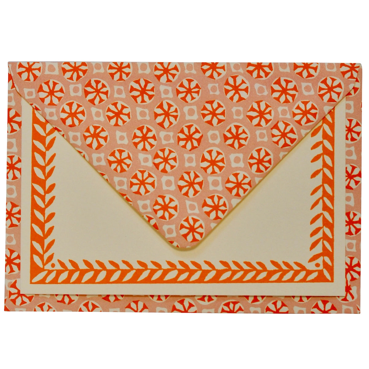 Patterned envelope with orange and white design on a white background