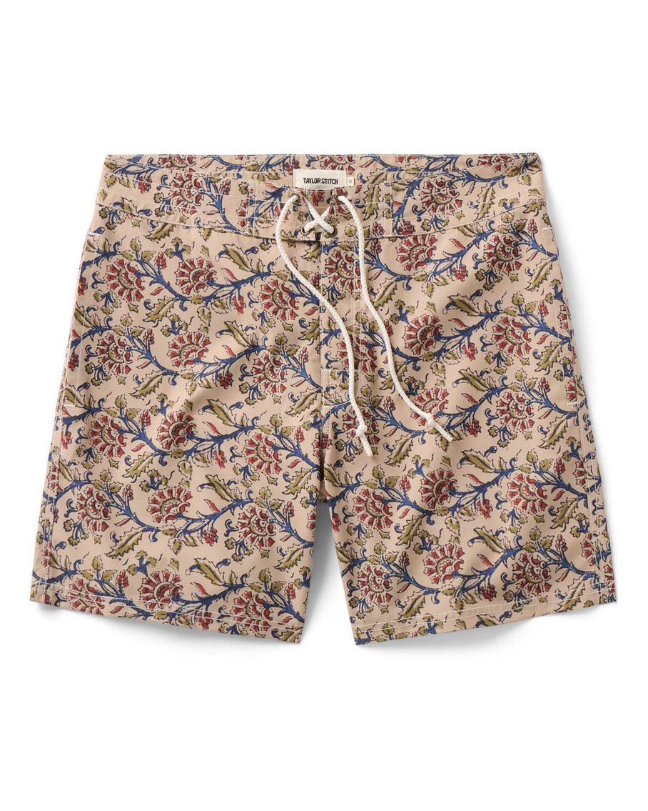 Floral patterned shorts with a drawstring on a white background
