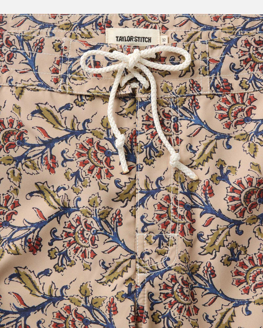 Floral patterned fabric with a drawstring, featuring the Taylor Stitch brand.