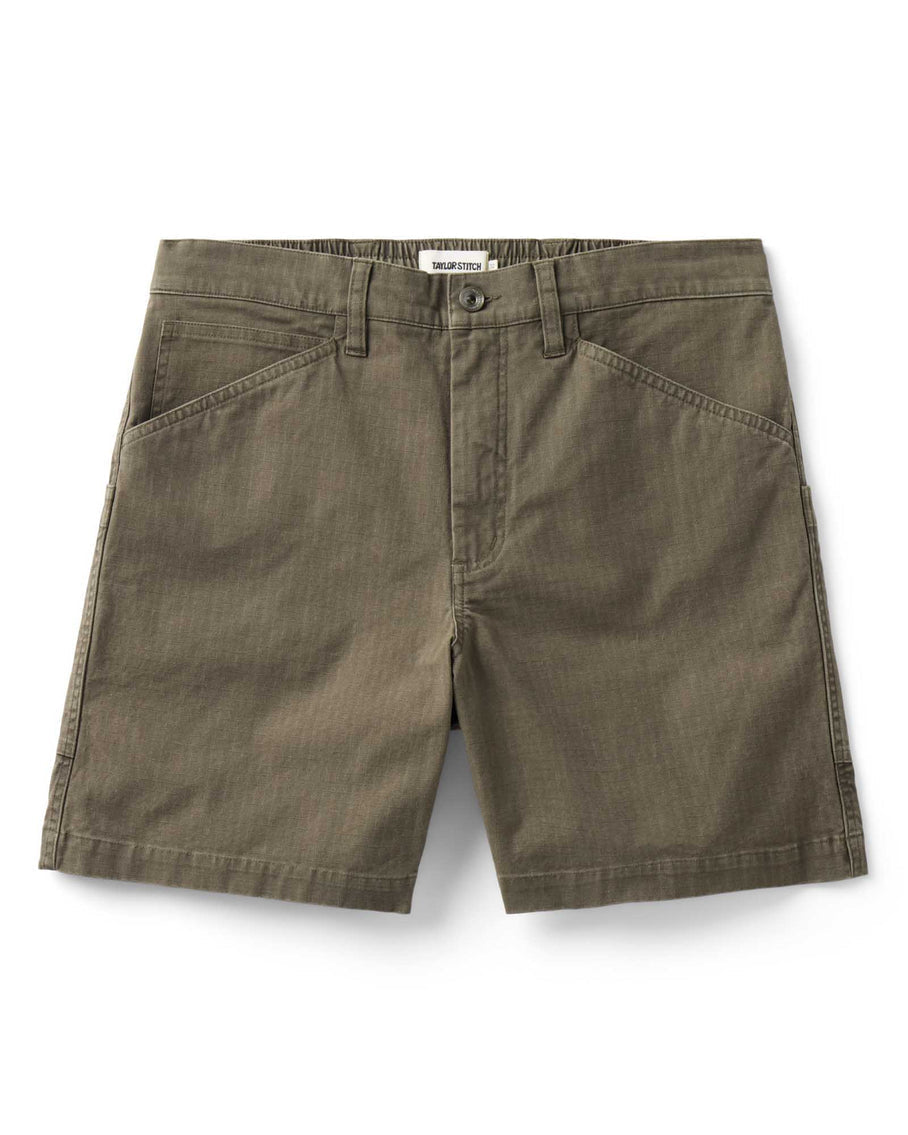 Olive green shorts on a white background