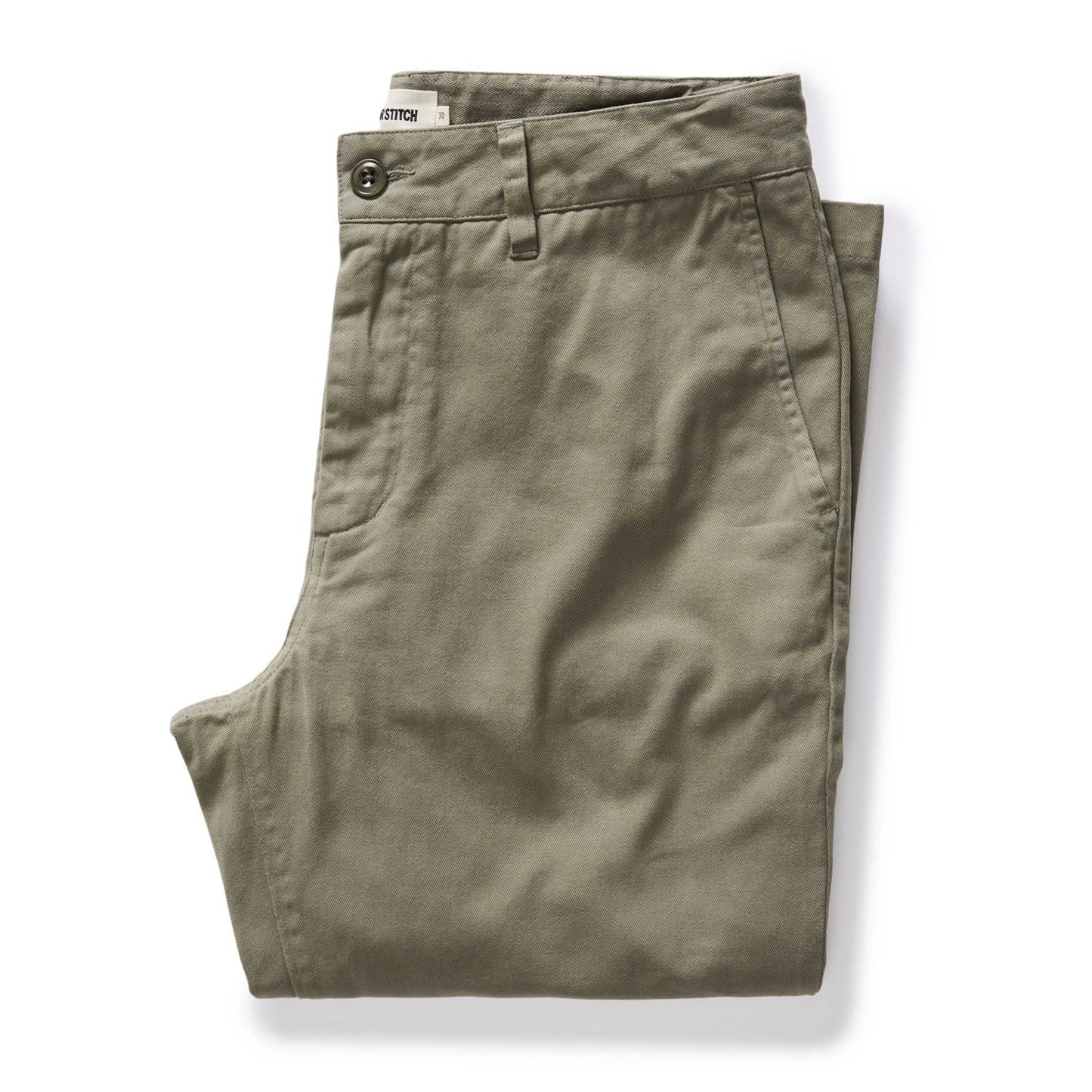 A pair of folded olive green chino pants on a clean white background.