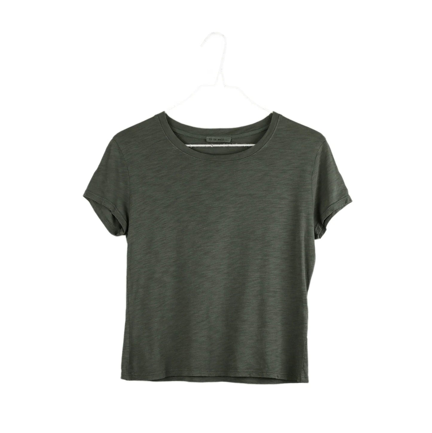 It Is Well Cropped Tee in Olive, flat hanger shot on white background showing solid olive army green lightweight slub jersey, clean crew neck, short fitted sleeves with slight cuff, and slightly cropped length in a slim petite fit
