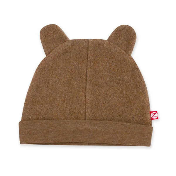 Zutano Heather Mocha fleece baby hat with two rounded bear ears, a wide folded band and a small red brand tag.
