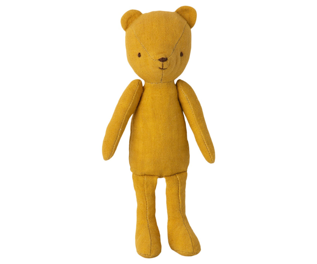 Maileg Teddy Junior stuffed bear in ochre linen, standing upright with poseable arms
