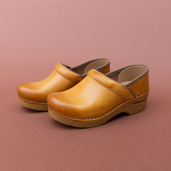 diagonal view dansko honey professional clog