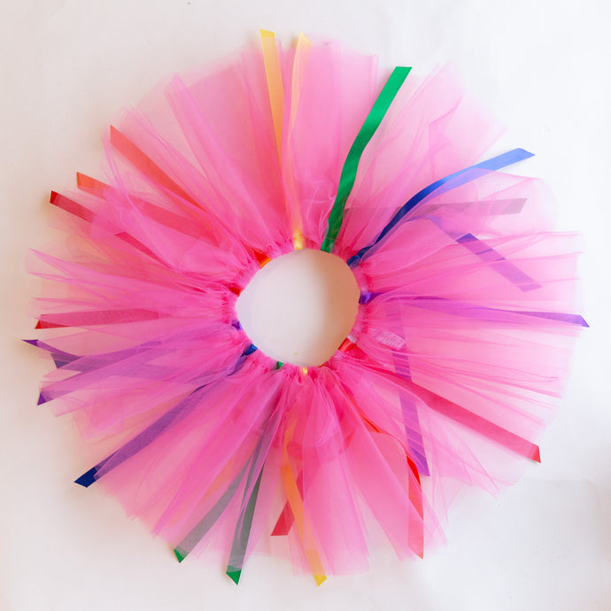 overhead view of fuchsia ribbon tutu