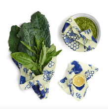 Load image into Gallery viewer, bee&#39;s wrap assorted 3 pack in situ with food on white background bees and bears
