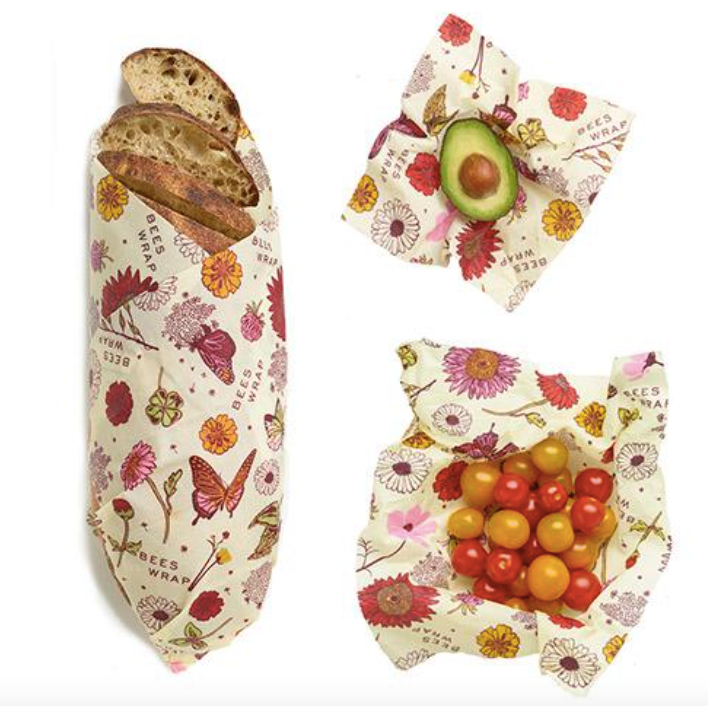 bee's wrap 3 pack meadow magic laydown on white background with food