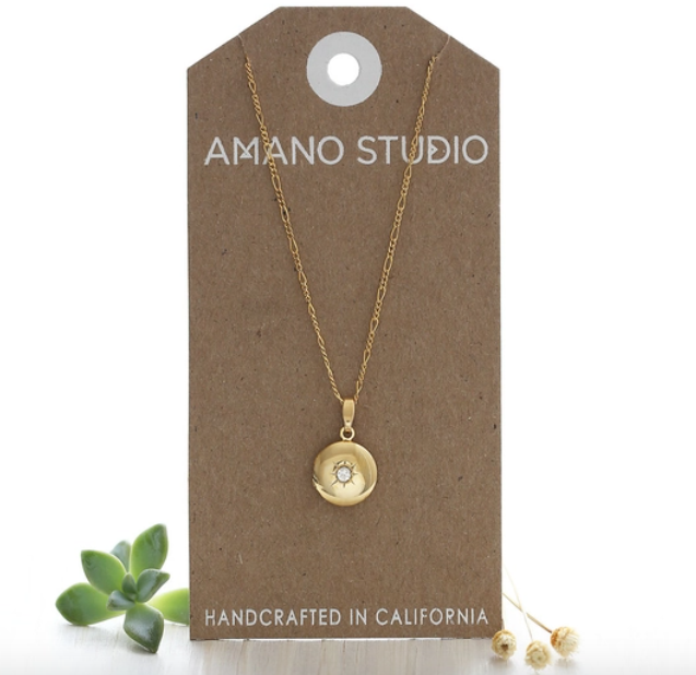 amano studio small round locket necklace front view in packaging