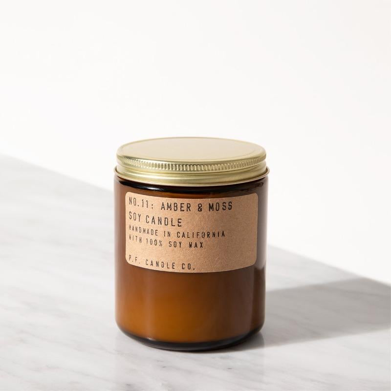 pf candle co amber moss candle front view on marble