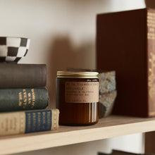 Load image into Gallery viewer, pf candle co teakwood tobacco candle front view in situ on bookshelf
